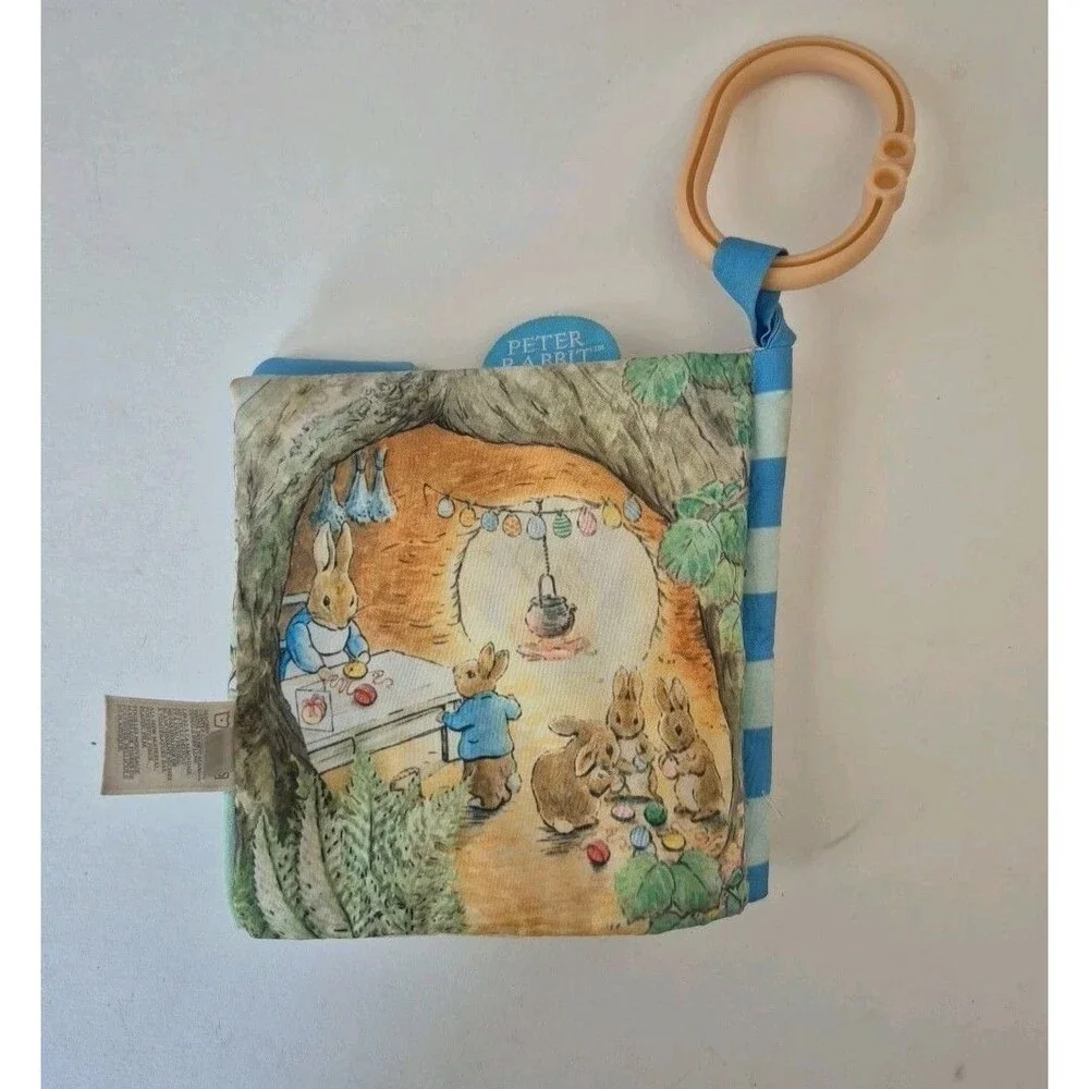 Peter Rabbit Soft Squeaky Baby Book with Silicone Teether & On the Go Clip